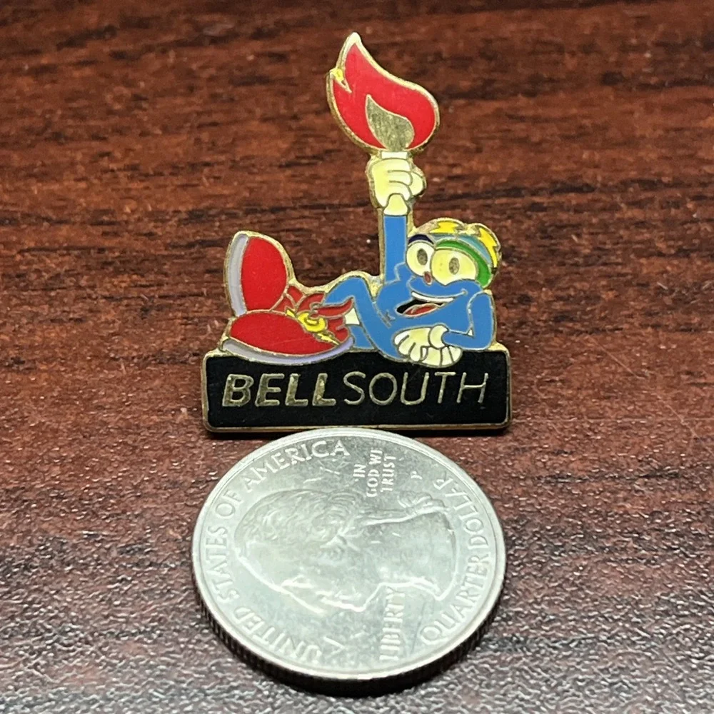 1996 Atlanta Summer Olympics BellSouth Phone Company Sponsor Izzy Lapel Hat Pin‎